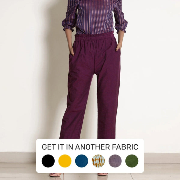 Front View of a Model wearing Solid Berry Wine Warm Cotton Tapered Pant