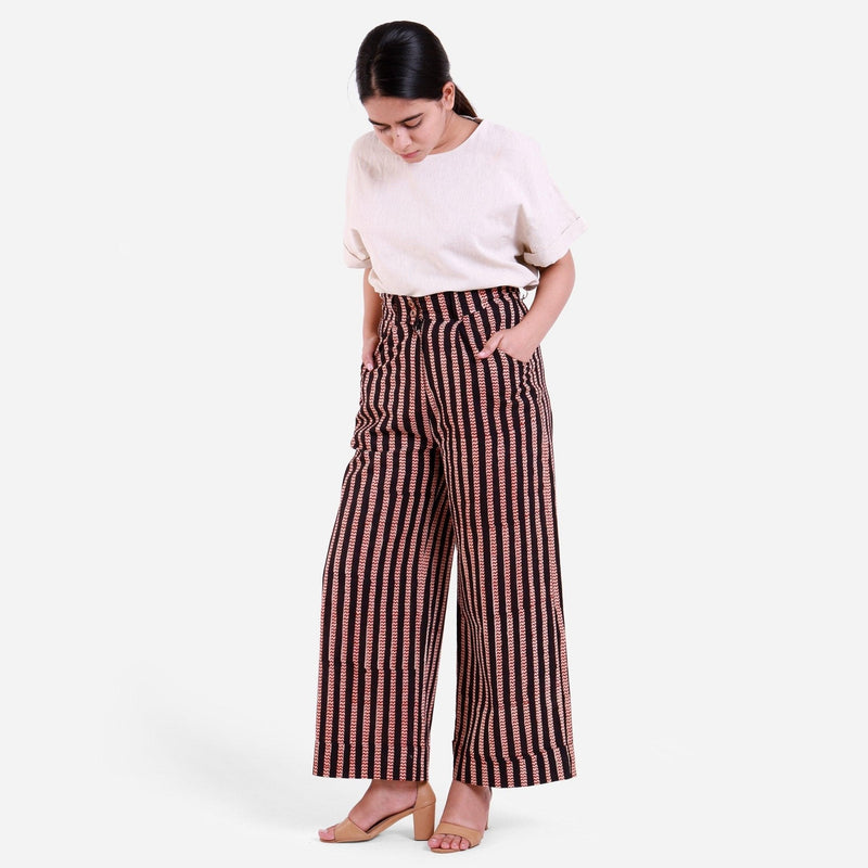 Front View of a Model wearing Striped High-Rise Baggy Cotton Pant