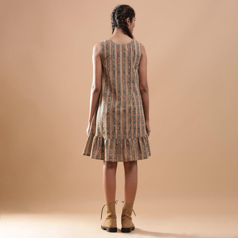 Back View of a Model wearing Striped Kalamkari Tiered Cotton Dress