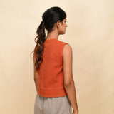 Back View of a Model wearing Sunset Rust Corduroy Button-Down Short Top