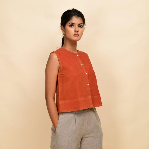 Right View of a Model wearing Sunset Rust Corduroy Button-Down Short Top