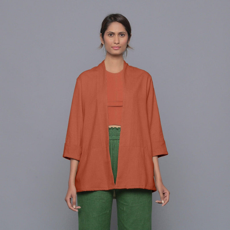 Front View of a Model wearing Sunset Rust Corduroy Front Open Overlay