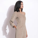 Right View of a Model wearing Taupe Beige Corduroy One-Shoulder Jumpsuit