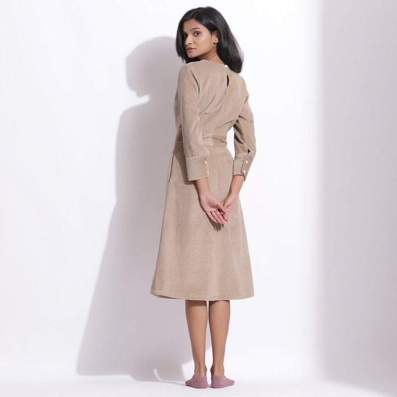 Back View of a Model wearing Cotton Corduroy Taupe Beige Surplice Dress