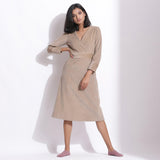 Front View of a Model wearing Cotton Corduroy Taupe Beige Surplice Dress