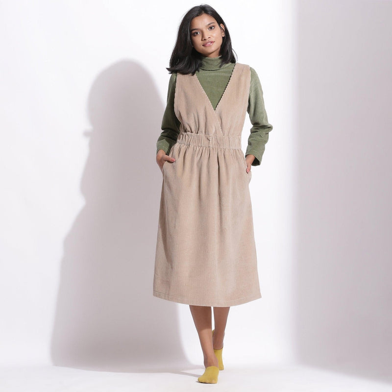 Front View of a Model wearing Taupe Beige Cotton Corduroy Pinafore Dress