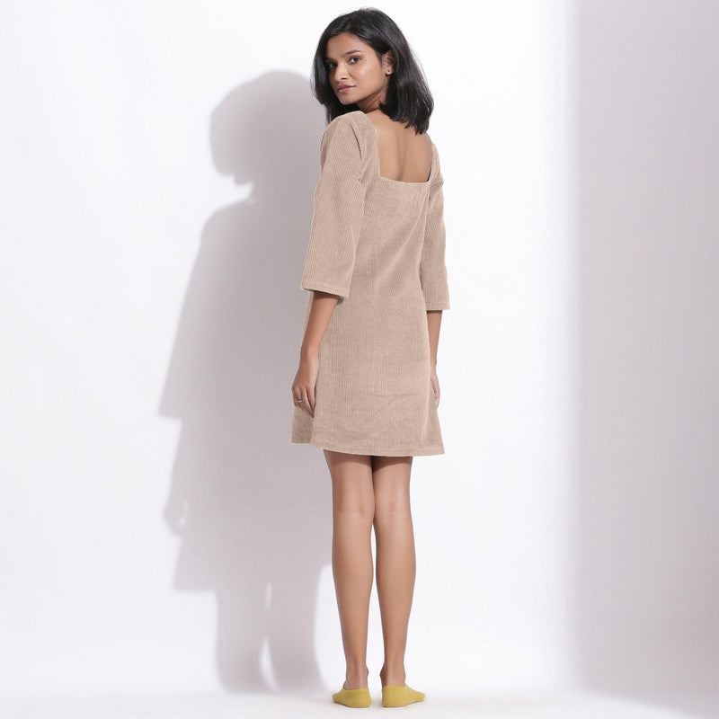 Back View of a Model wearing Taupe Beige Cotton Corduroy Square Neck Dress