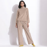 Front View of a Model wearing Taupe Beige High Neck Top and Pant Set