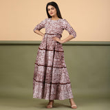 Front View of a Model wearing Taupe Shibori Tie-Dye Cotton Ankle Length Tier Bohemian Dress