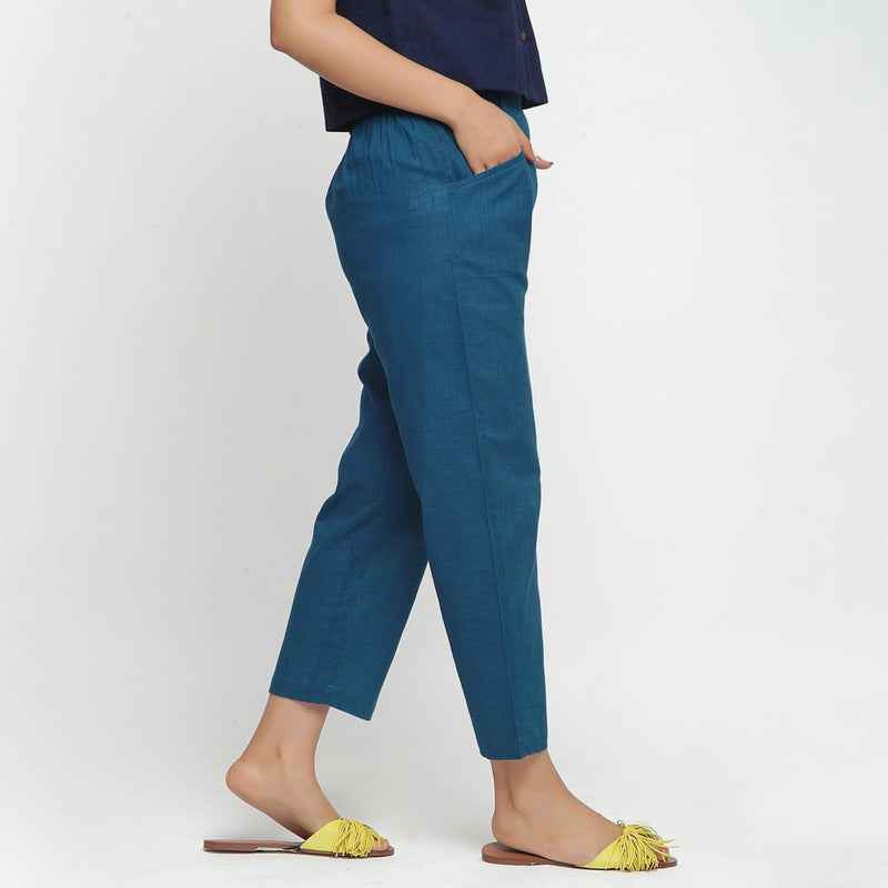  Right View of a Model wearing Teal Ankle Length Mid-Rise Chinos