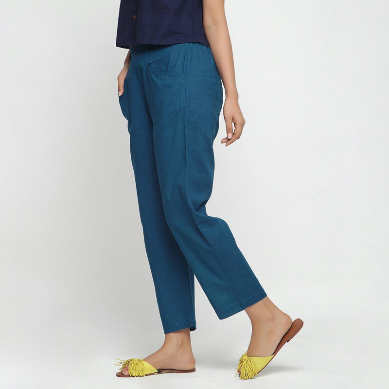 Left View of a Model wearing Teal Ankle Length Mid-Rise Chinos