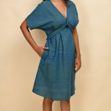 Front Detail of a Model wearing Teal 100% Cotton Blouson Dress