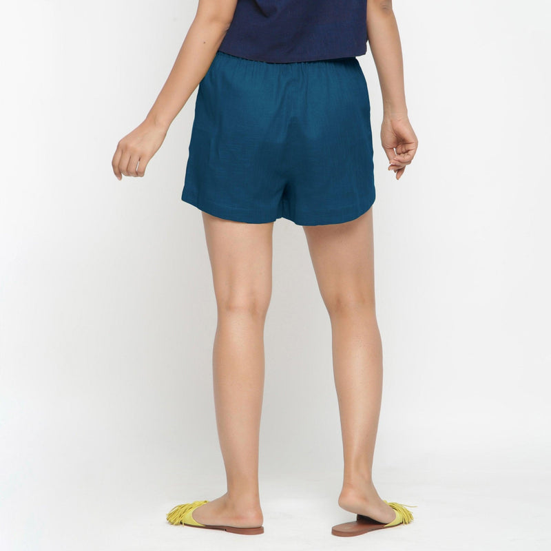 Back View of a Model wearing Teal Solid Cotton Short Shorts