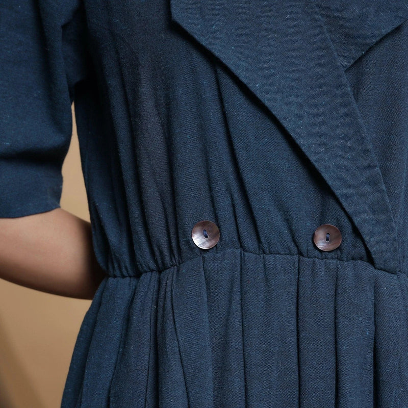 Front Detail of a Model wearing Teal Blue Lapel Collar Pleated Jumpsuit