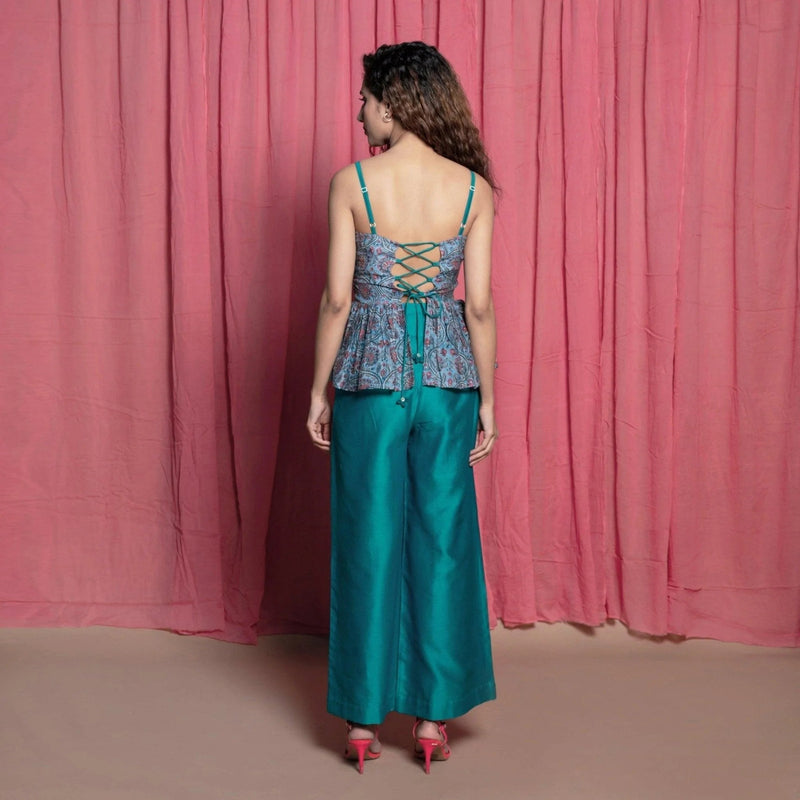 Back View of a Model wearing Teal Chanderi Cotton Block Print Peplum Top