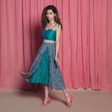 Left View of a Model wearing Teal Chanderi Block Printed Slit Skirt