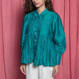 Front Detail of a Model wearing Teal Chanderi Button Down Tier Top