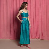 Right View of a Model wearing Teal Chanderi Crop Top and Pant Set