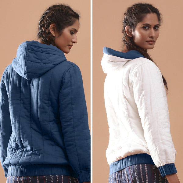 Back View of a Model wearing Teal Reversible Quilted Cotton Bomber Jacket