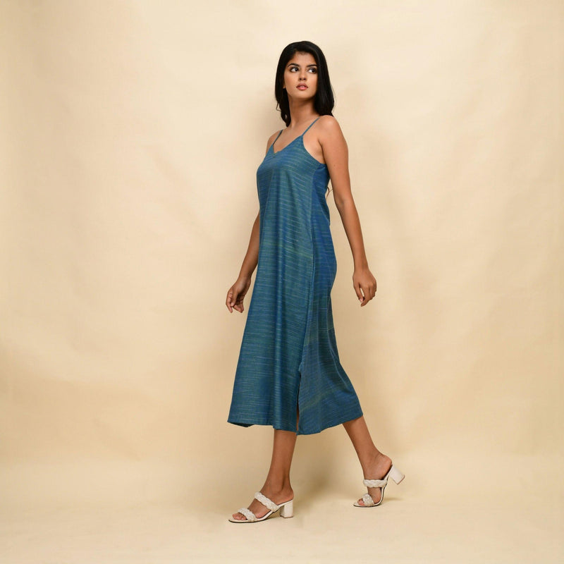 Left View of a Model wearing Teal 100% Cotton Khadi A-Line Dress