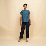 Front View of a Model wearing Teal Handspun Cotton Relaxed Fit Gathered Top