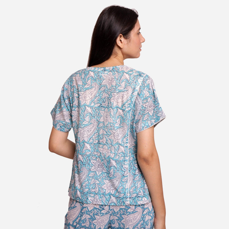 Back View of a Model wearing Turquoise Sanganeri Paisley Print Top