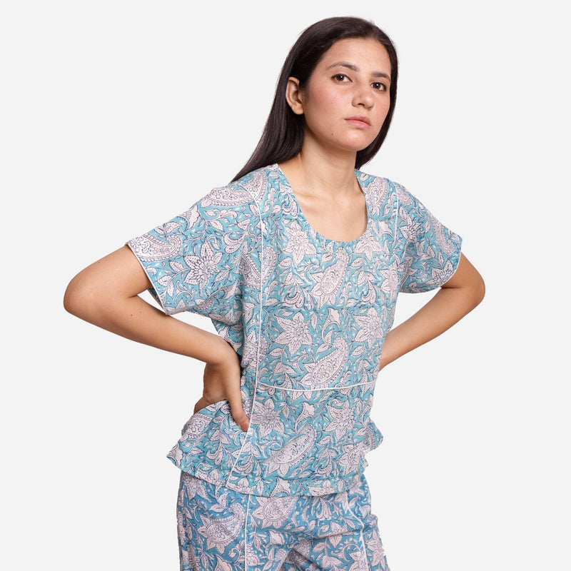 Front View of a Model wearing Turquoise Sanganeri Paisley Print Top