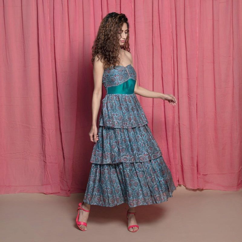 Right View of a Model wearing Twirly Teal Chanderi Block Print Layer Dress