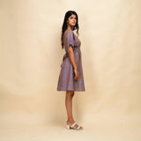 Right View of a Model wearing Vintage Plum 100% Cotton Knee Length Blouson Dress