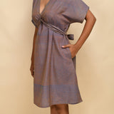 Front Detail of a Model wearing Vintage Plum 100% Cotton Knee Length Blouson Dress