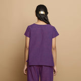 Back View of a Model wearing Violet Yarn Dyed Cotton Round Neck Godet Top