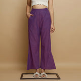 Front View of a Model wearing Violet Yarn Dyed Cotton Elasticated Mid-Rise Godet Pant