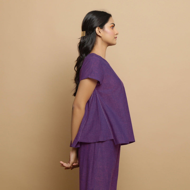 Right View of a Model wearing Violet Yarn Dyed Cotton Round Neck Godet Top