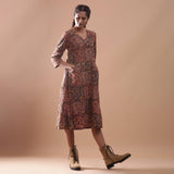 Right View of a Model wearing Flannel Kalamkari Muddy Red V-Neck Dress