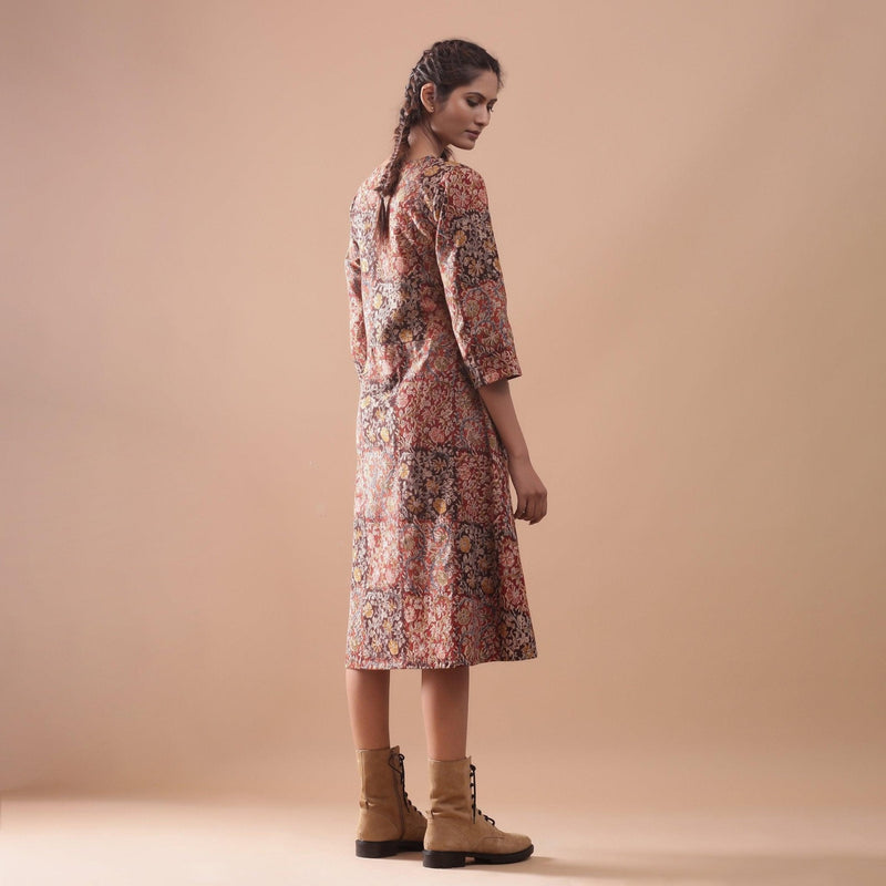 Right View of a Model wearing Flannel Kalamkari Muddy Red V-Neck Dress