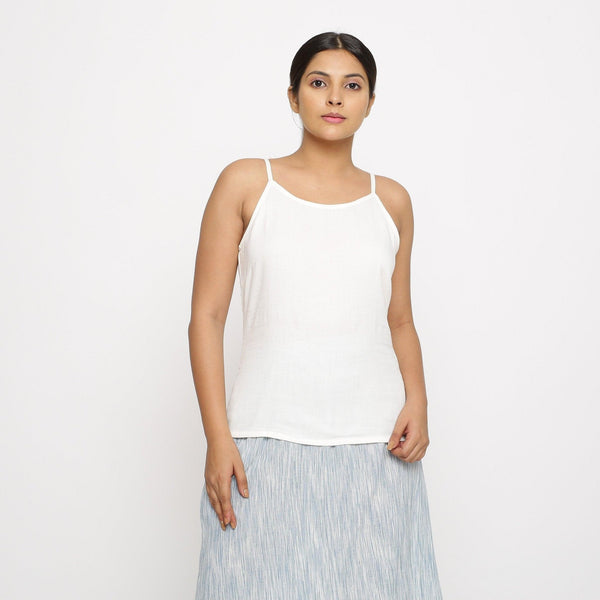 Front View of a Model wearing Solid White Cotton Moss Spaghetti Top