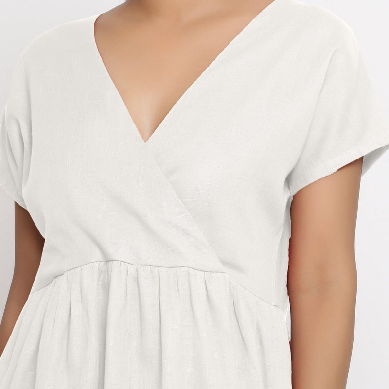 white wrap dress short Stole Your Love White Swiss Dot Faux-Wrap Mini Dress