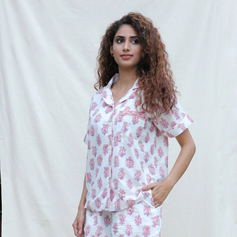 Front View of a Model wearing White and Fuchsia Block Printed Cotton Half Sleeve Shirt