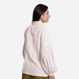 Back View of a Model wearing White Bishop Sleeve Cotton Shirt