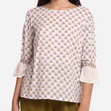 Front Detail of a Model wearing Block Printed Frilled Puff Sleeves Top