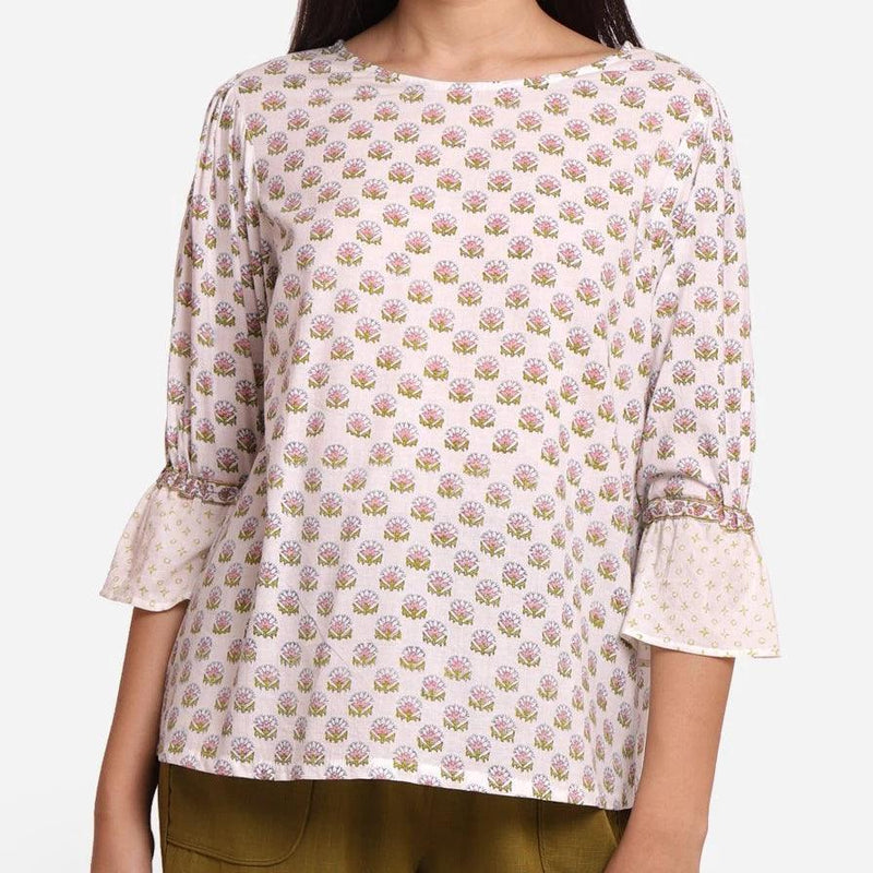 Front Detail of a Model wearing White Block Printed Cotton Frilled Puff Sleeves Top