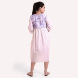 Back View of a Model wearing White Block Printed Cotton Knee Length Wrap Dress