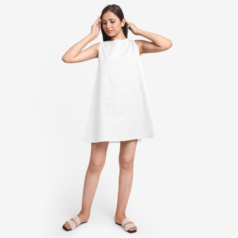 Front View of a Model wearing White Cotton Flax Kangaroo Pocket Dress