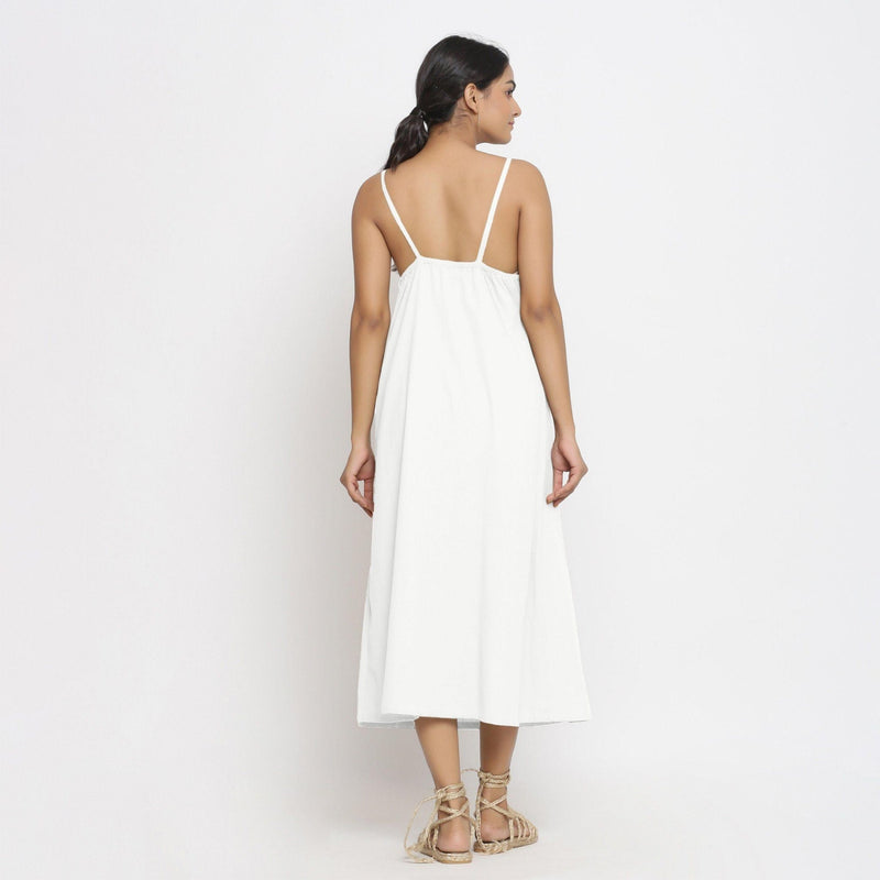 Back View of a Model wearing White Cotton Flax Strap Sleeve A-Line Dress