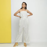 Front View of a Model wearing White Cotton Schiffli Floral Jumpsuit