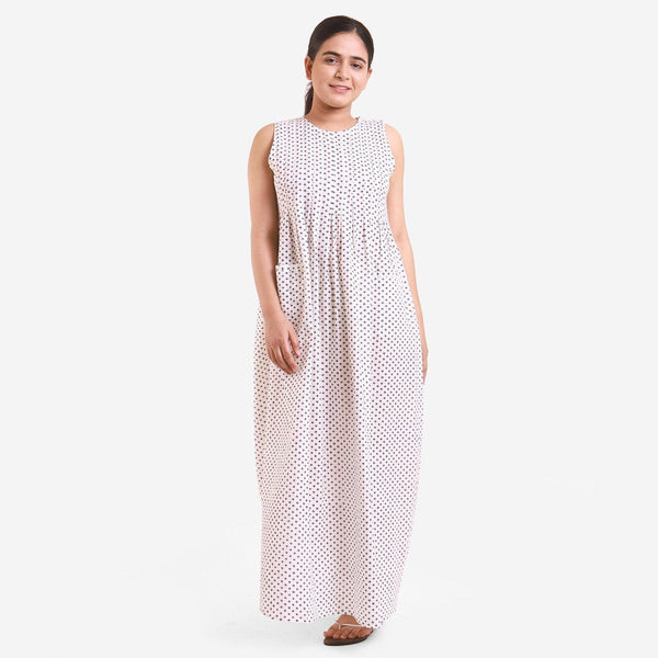 Front View of a Model wearing White Ditsy Block Print Cotton Ankle Length Flared Dress