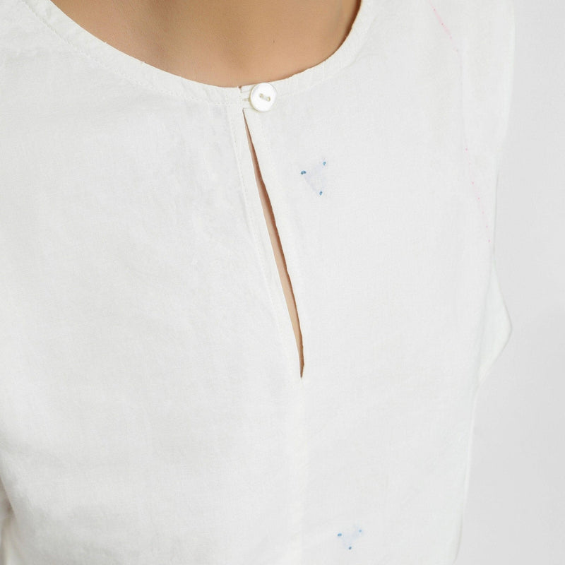 Front Detail of a Model wearing Hand Embroidered Organic Cotton Paneled Top