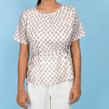 Front Detail of a Model wearing White Floral Block Printed Cotton A-Line Top