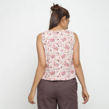 Back View of a Model wearing White Floral Printed Sleeveless Top