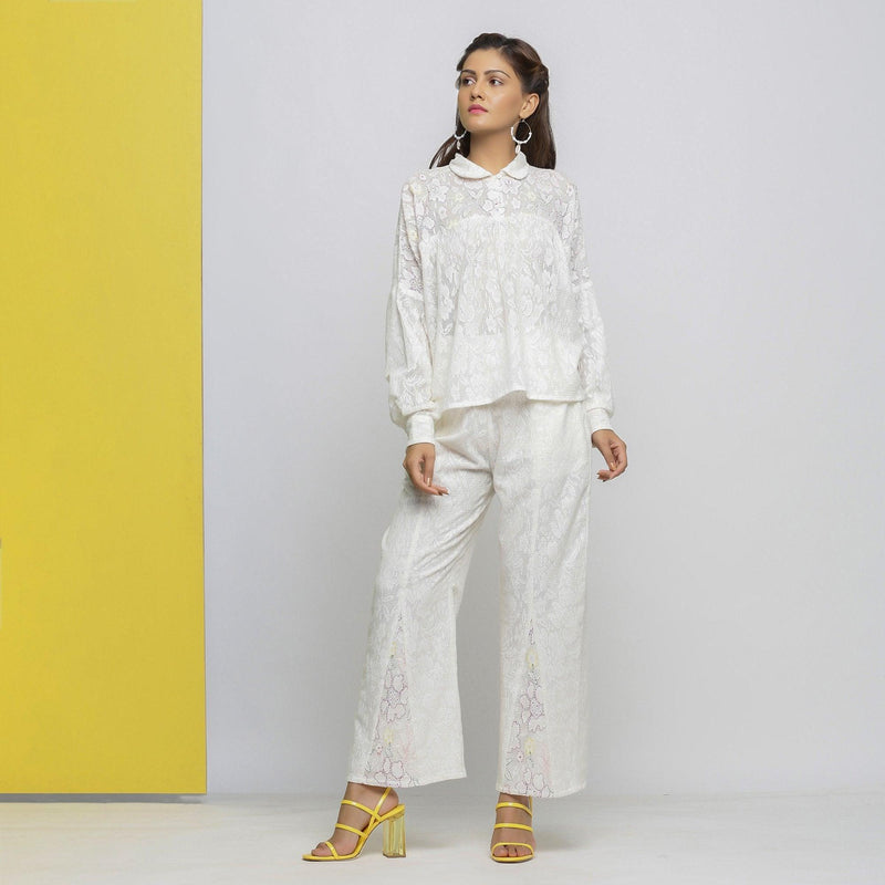 Front View of a Model wearing White Floral Hand-Embroidered Cotton Lace Yoked Shirt